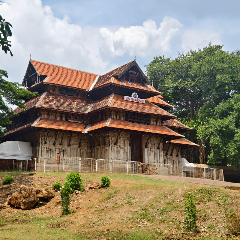 Ancient stone walls and gabled roofs of Vadakkunnathan Temple Thrissur