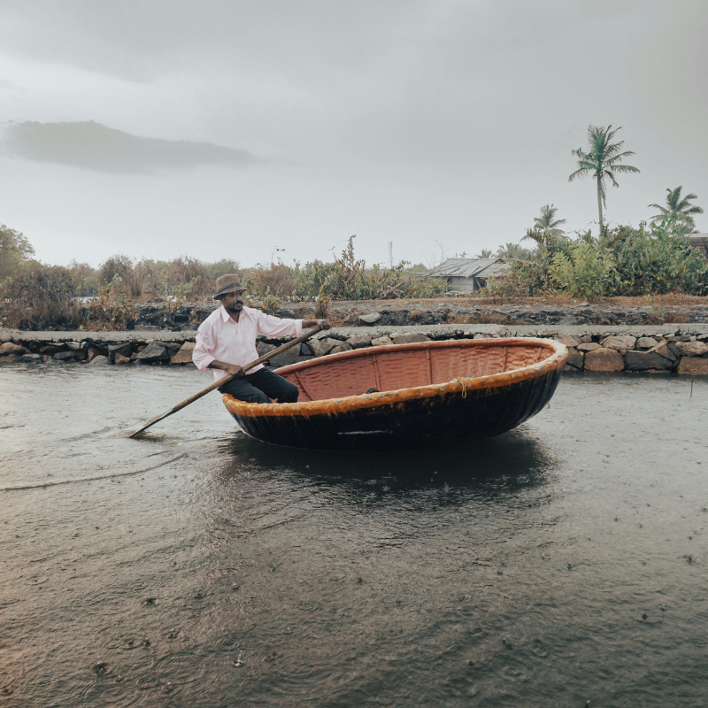 Traditional canoe cruise in narrow canals of Munroe Island