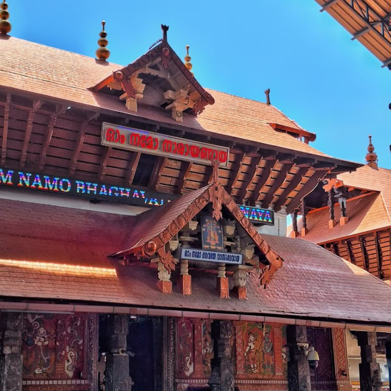 The iconic gold-plated flagstaff and entrance of Guruvayur Temple