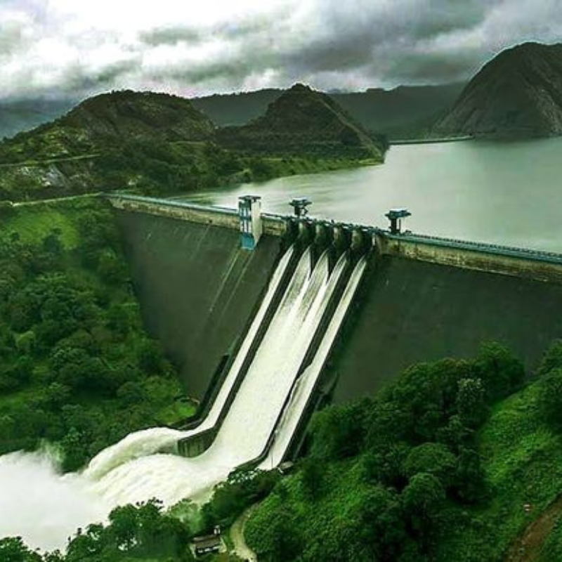 Massive concrete arch dam between two mountains in Idukki
