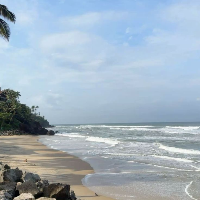Clean shoreline and beach park at Snehatheeram Beach Thrissur