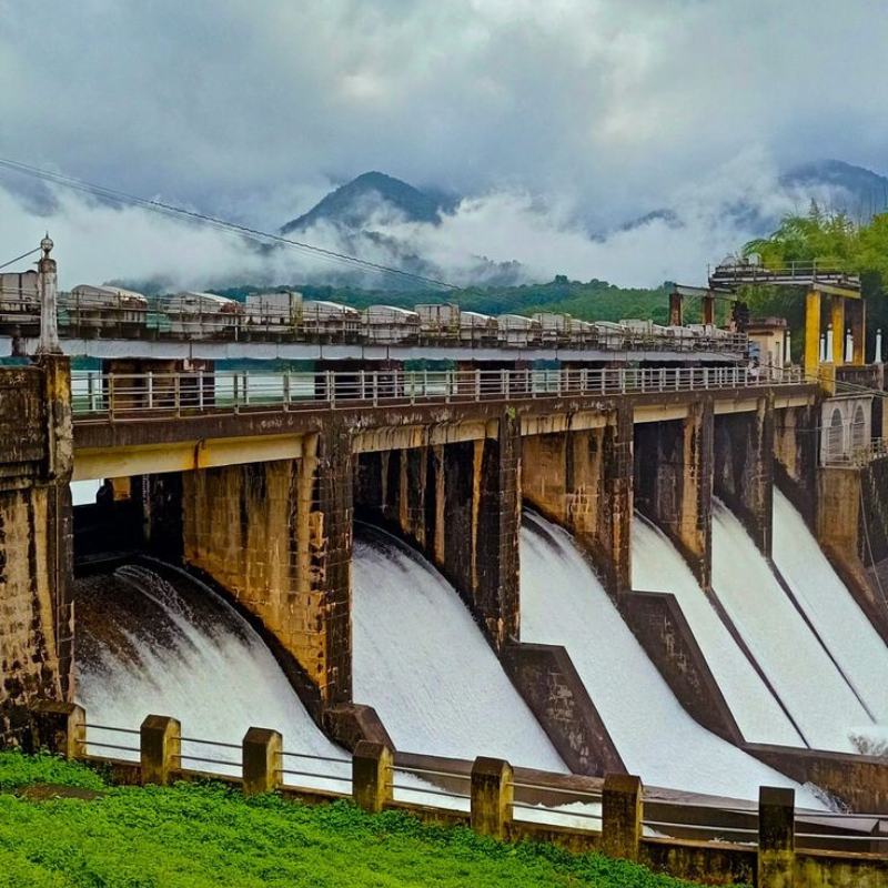 Scenic view of Malampuzha Dam with the ropeway and lush gardens