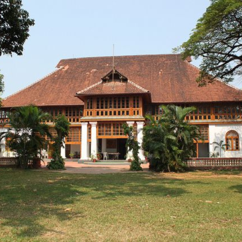 Dutch-built Bolgatty Palace surrounded by lush gardens on an island