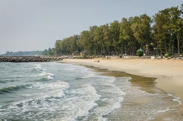 Historic remains of an old pier at sunset on Kozhikode Beach