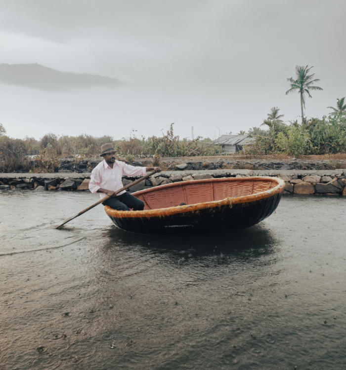 Traditional canoe cruise in narrow canals of Munroe Island