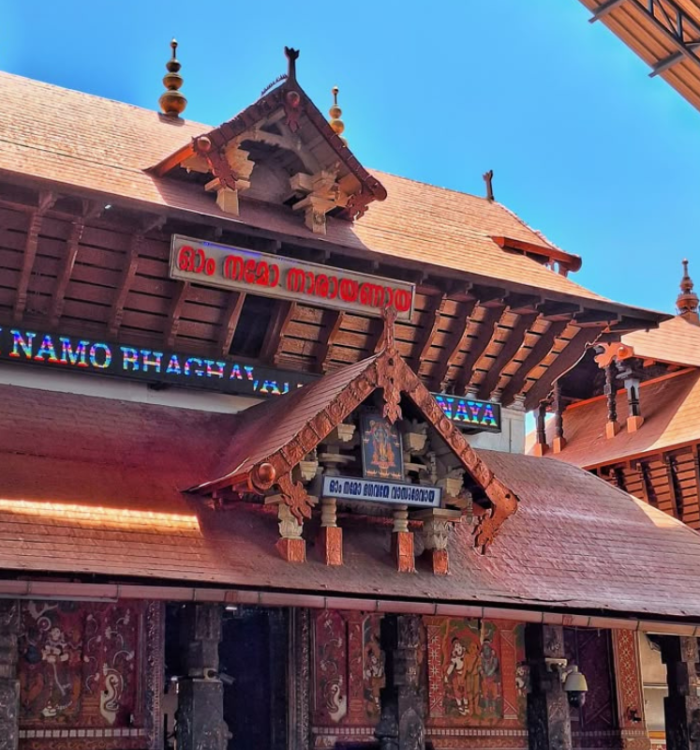 The iconic gold-plated flagstaff and entrance of Guruvayur Temple