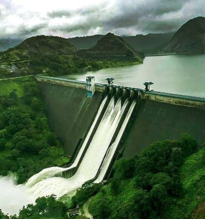 Massive concrete arch dam between two mountains in Idukki