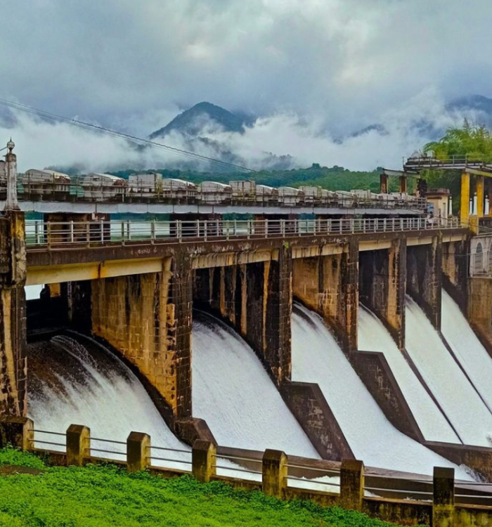 Scenic view of Malampuzha Dam with the ropeway and lush gardens