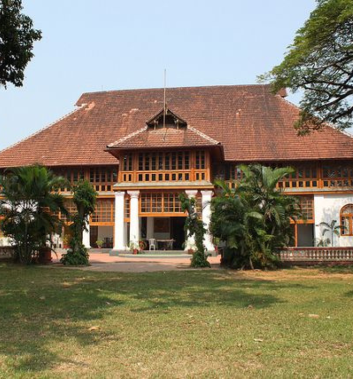 Dutch-built Bolgatty Palace surrounded by lush gardens on an island